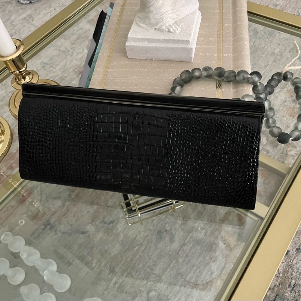 Ann Taylor crocodile
pattern clutch purse